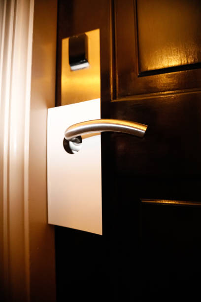 istock Do Not Disturb Hotel Door Knob Hanger 1129986259
