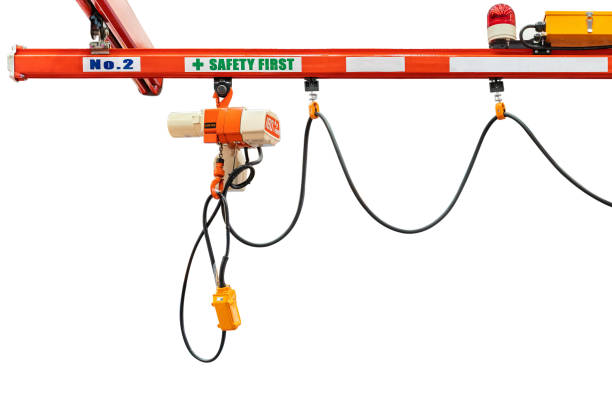 istock Overhead electric chain hoist with hook remote switch control isolated on white background with clipping path 1130004514