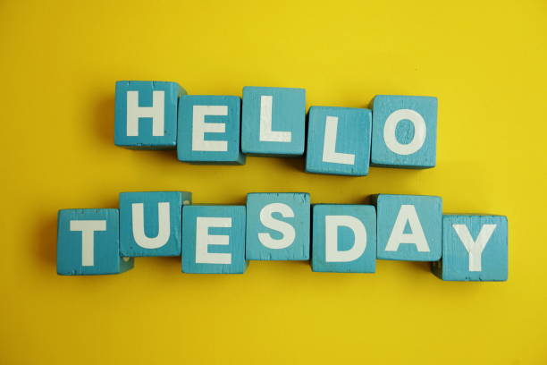 istock Hello Tuesday alphabet letters on yellow background 1130010663