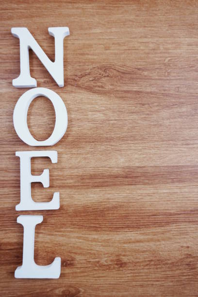 istock Noel Word alphabet letters with space copy on wooden background 1130010830