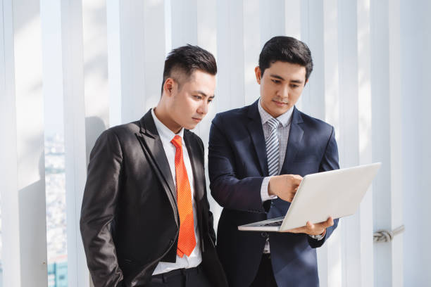 istock business people working with laptop 1130015816