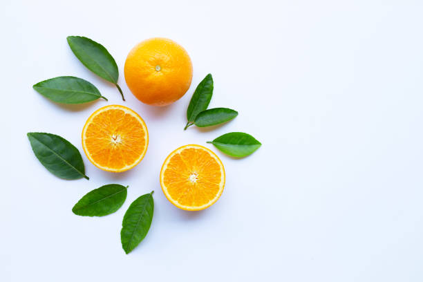 istock High vitamin C. Fresh orange citrus fruit with leaves isolated on white 1130015899