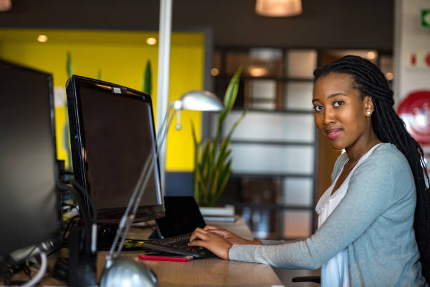 istock Successful businesswoman working at her desk 1130017519
