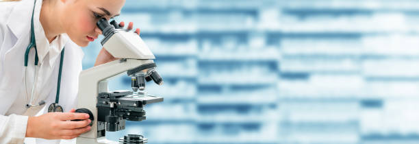 istock Scientist researcher using microscope in laboratory. Medical healthcare technology and pharmaceutical research and development concept. 1130027636