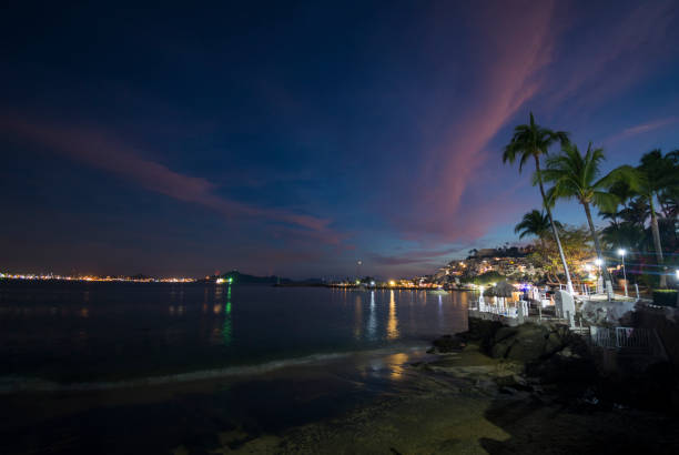 istock Las Hadas bay at night. 1130027654