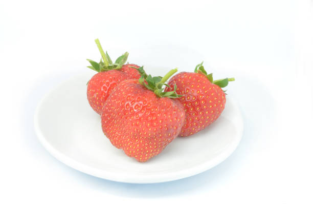 Three Strawberries stock photo
