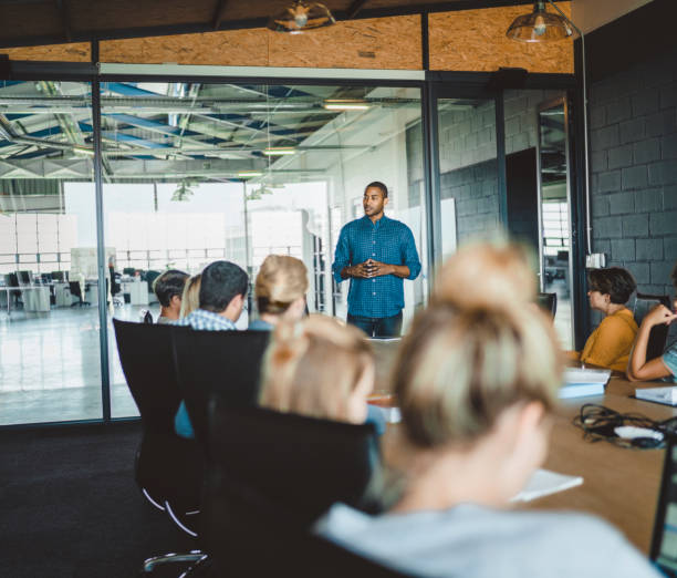 istock Businessman sharing ideas in meeting room 1130039985