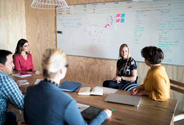 istock Business people having discussion in board room 1130041038