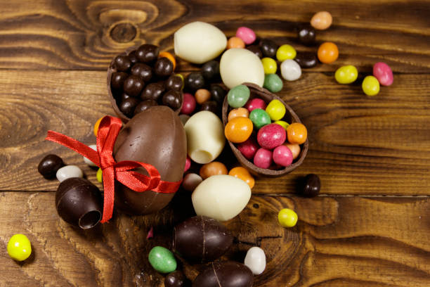 istock Easter composition with chocolate eggs on wooden background 1130042737