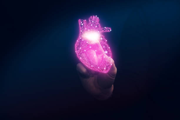 istock Human forefinger touches neon heart innovative technologies. Mixed media. 1130046178