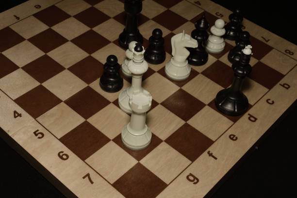 istock Wooden chess board under the pieces for game backdrop 1130047926