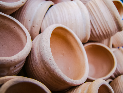 Clay pots in a pile, lots of pottery Clay pots in a pile, lots of pottery