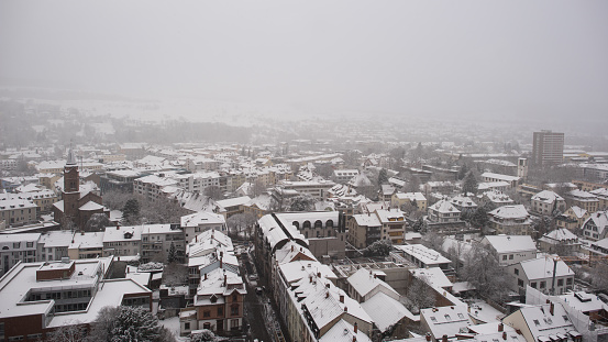 cityscape in winter time with snowfall in lörrach