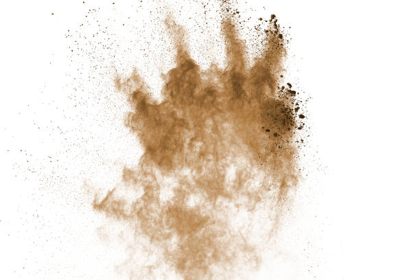 istock Brown color powder explosion on white background. Colored cloud. Colorful dust explode. Paint Holi. 1130052187