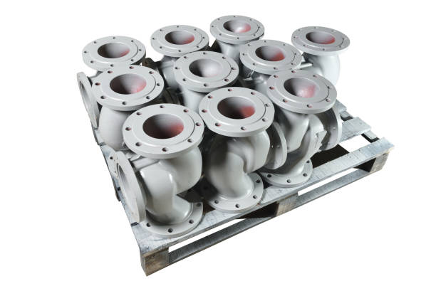 istock Gray metal pipes, bases for making valves, lie on a wooden panel before further processing on a milling machine. Reasons for creating valves in a factory, isolated 1130053111