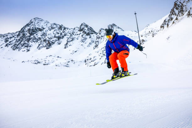 istock Man skiing on the ski slopes 1130053597