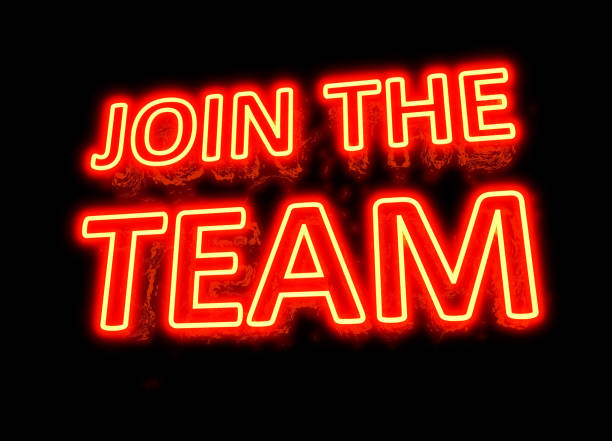 istock NEON JOIN THE TEAM SIGN - NEON RECRUITMENT SIGN 1130053755