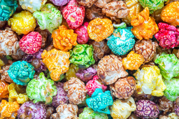 istock Colorful candy popcorn background. Top view. 1130054459