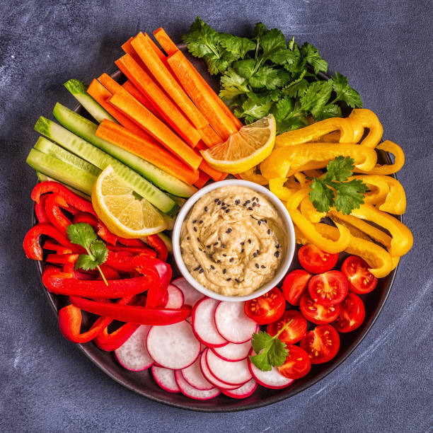 istock Homemade hummus with fresh vegetables 1130055805