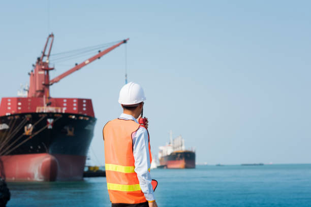 istock Harbor master supervisor is survey and inspection of the safty berthing along side 1130057074