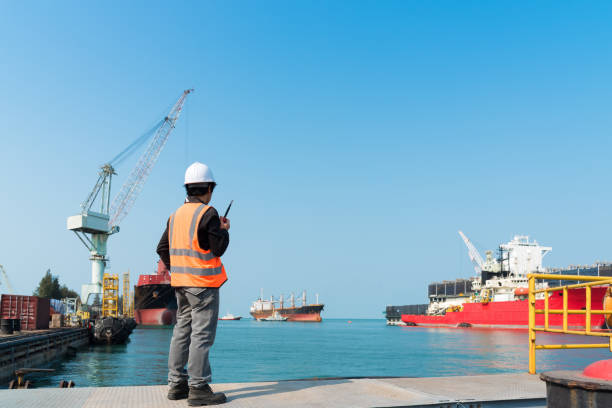istock Harbor master supervisor is survey and inspection of the safty berthing along side 1130057131