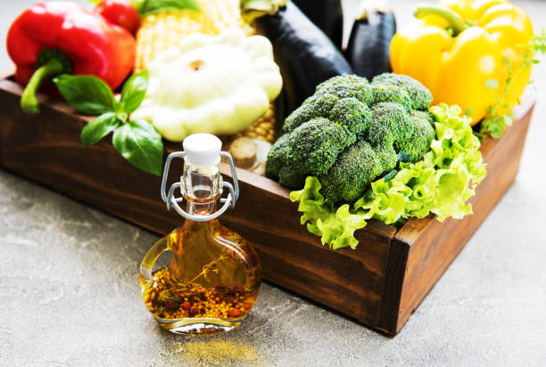 different raw vegetables and olive oil