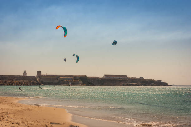 View of the beach of Tarifa (Playa de Tarifa), famous spot for kite surf in Andalusia, Spain. Panoramic view of the beach of Tarifa (Playa de Tarifa), famous spot for kite surf in Andalusia, Spain. tarifa stock pictures, royalty-free photos & images