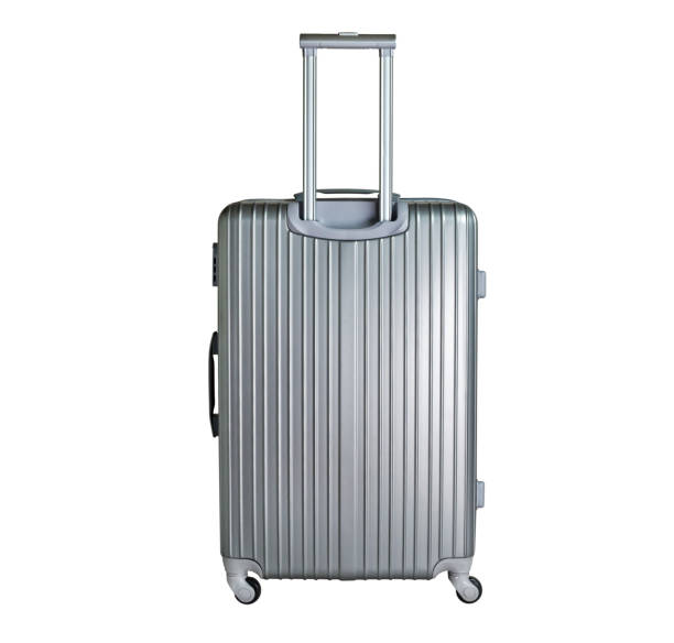 istock Gray suitcase isolated on white background. Polycarbonate suitcase isolated on white. Gray suitcase. 1130059093