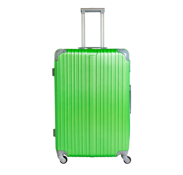 istock Green suitcase isolated on white background. Polycarbonate suitcase isolated on white. Green suitcase. 1130059115
