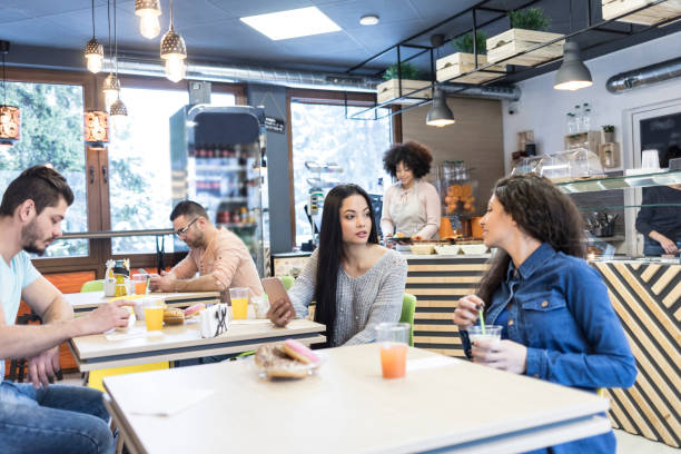 istock Young people in cafe 1130062299