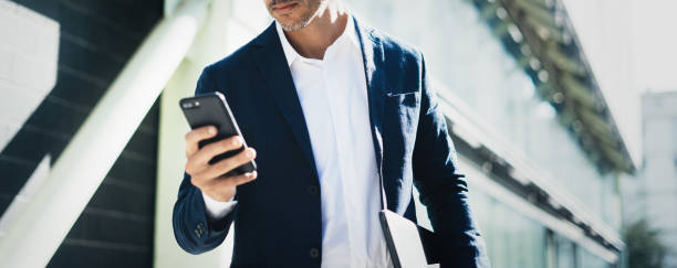 istock Businessman with smartphone 1130062362