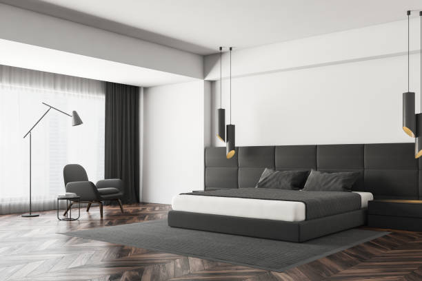 istock White bedroom corner with armchair 1130064353
