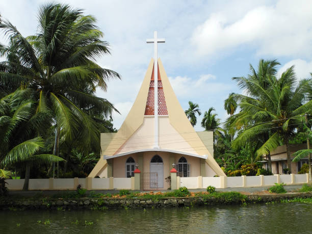 Christian catholic church on the backwater channel in Kerala Kochi Christian catholic church on the backwater channel in Kerala Kochi kochi india stock pictures, royalty-free photos & images