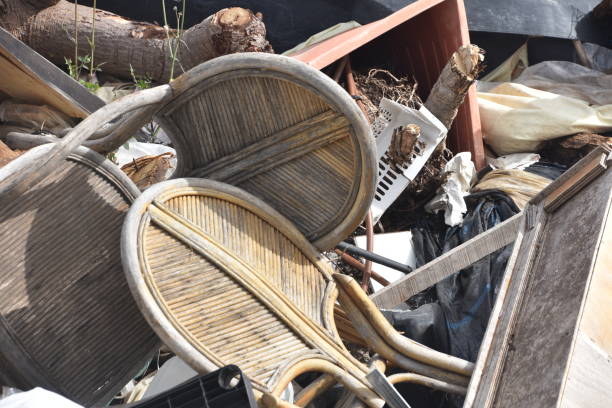 istock Vintage chairs strewn in a landfill 1130069381