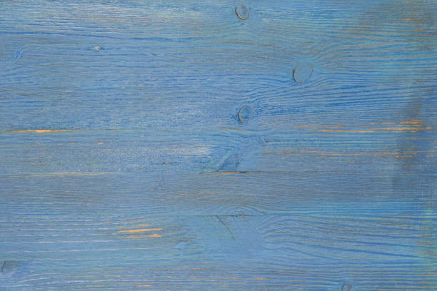 istock Background from textured aged boards of a blue color. 1130079866