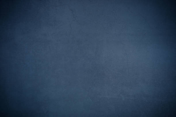 istock Background wall of aged textured old plaster blue. 1130079882