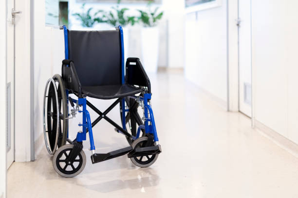 istock Empty wheelchair on corridor in hospital 1130082347