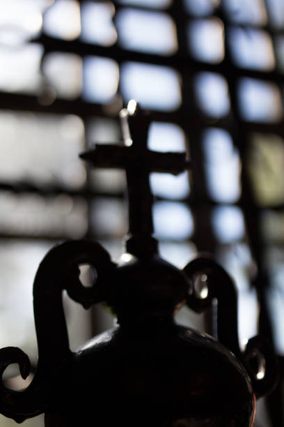 Metal cross in monastery Metal cross in monastery. Krakow in Poland złoto stock pictures, royalty-free photos & images