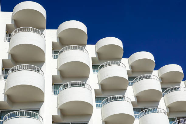 istock Balconies of a modern building . blue sky background 1130083781