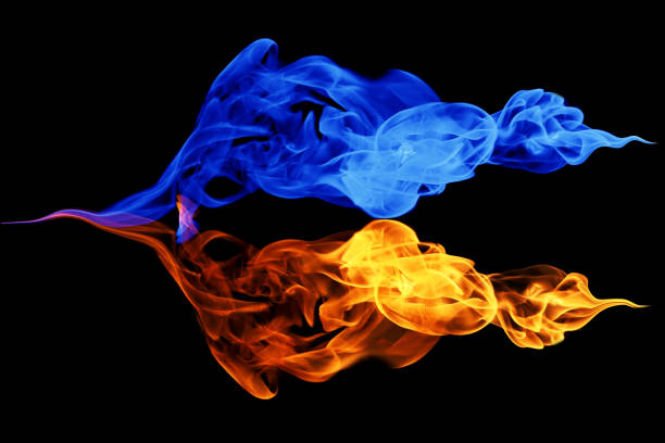 istock Yin-yang symbol, fire and ice background 1130086275