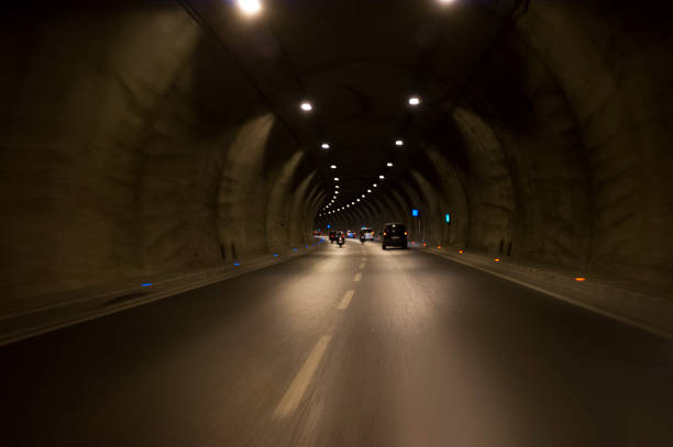 Long exposure Izmir Konak tunnel Turkey with lights, defocused cars and speed limit signs.