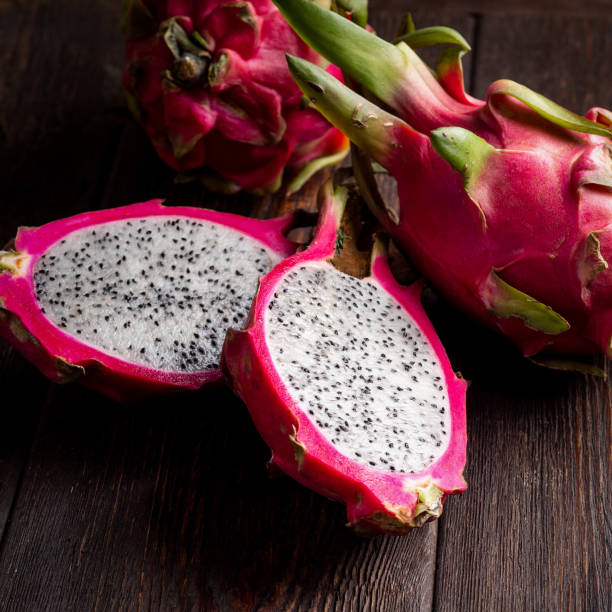 istock Pitahaya on dark brown wooden background. 1130099608
