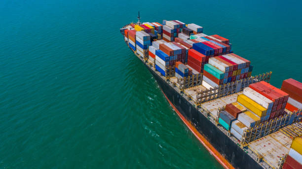 istock Container ship arriving in port, container ship going to deep sea port, logistic business import export shipping and transportation, Aerial view. 1130101583