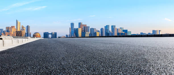 istock Asphalt road through Hangzhou business district 1130101862