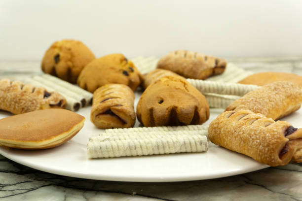 istock Gingerbread cookies and molds on the plank table 1130103501