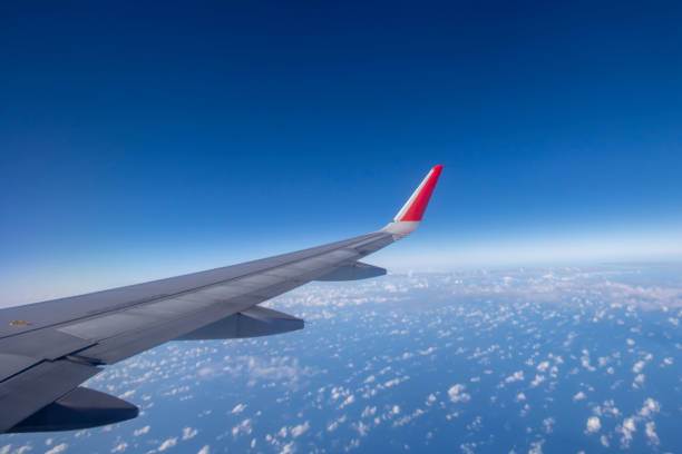 istock Aeroplane wing view from window beautiful sky. Traveling concept 1130103505