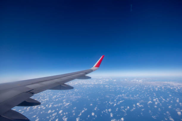 istock Aeroplane wing view from window beautiful sky. Traveling concept 1130103568