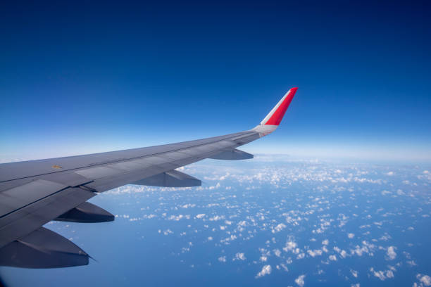 istock Aeroplane wing view from window beautiful sky. Traveling concept 1130103599