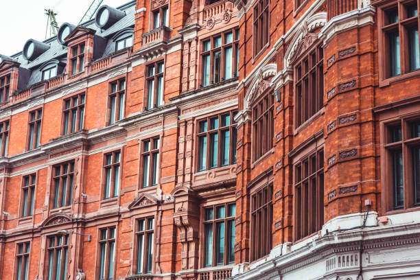 Elegant Red-Brick House Elegant red-bricks house in London. window chimney london england residential district stock pictures, royalty-free photos & images