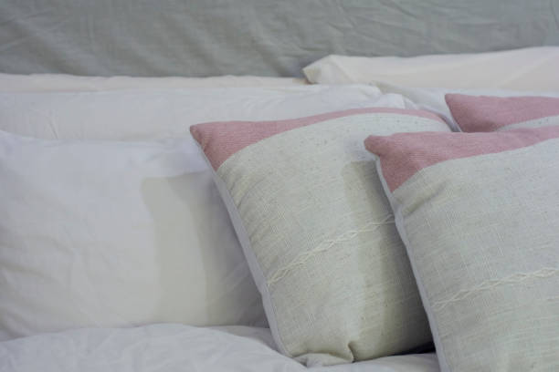 istock Closeup of decorative pillows in staging 1130108865